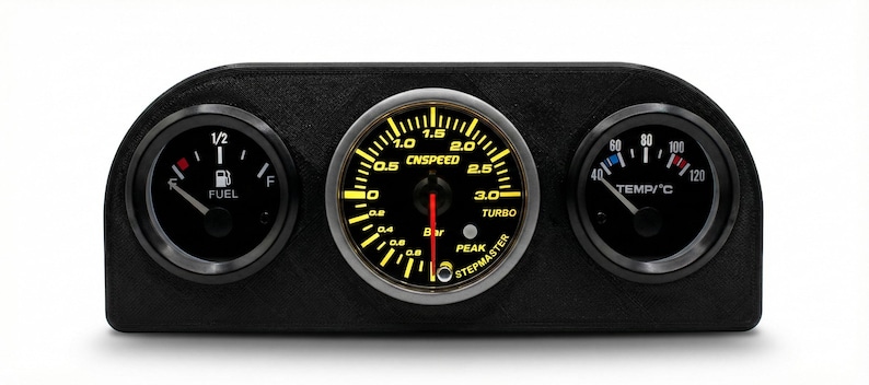 May include: A black dashboard gauge cluster with three circular gauges. The left gauge shows fuel level, the center gauge reads "CNSPEED" and "TURBO", and the right gauge displays temperature in Celsius. The gauges have yellow illumination.