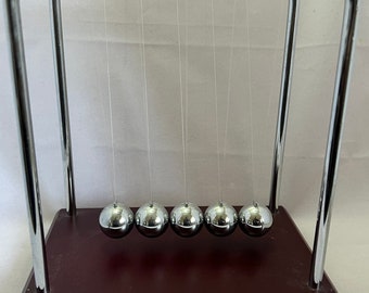 Newton Cradle Balance Pendulum on a wood panel- Stress relief -Office Desk Deco