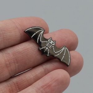 Skeleton Bat Glow in the Dark Enamel Pin | Cute Halloween Gift | Witchy Accessory for Goths and Emo