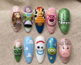 Leuke plaknagels met figuurtjes, 3D cartoon nagelkunst, ruimte cowboy alien nagels, kleurrijke acryl nepnagels, opvallende nagels