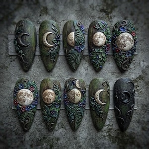 May include: Ten oval-shaped decorative plaques arranged in two rows, each featuring a textured green base with sculpted botanical elements like ferns and flowers, paired with metallic-toned moon phases ranging from a crescent to a full moon.