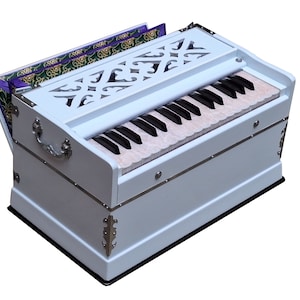 May include: A white wooden harmonium with a keyboard and bellows. The harmonium has a decorative carved design on the top and silver accents.