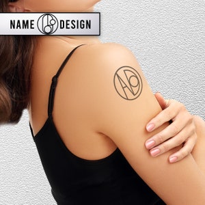 tattoo with name logo. Tattoo with a sample name logo on a woman's back or shoulder area