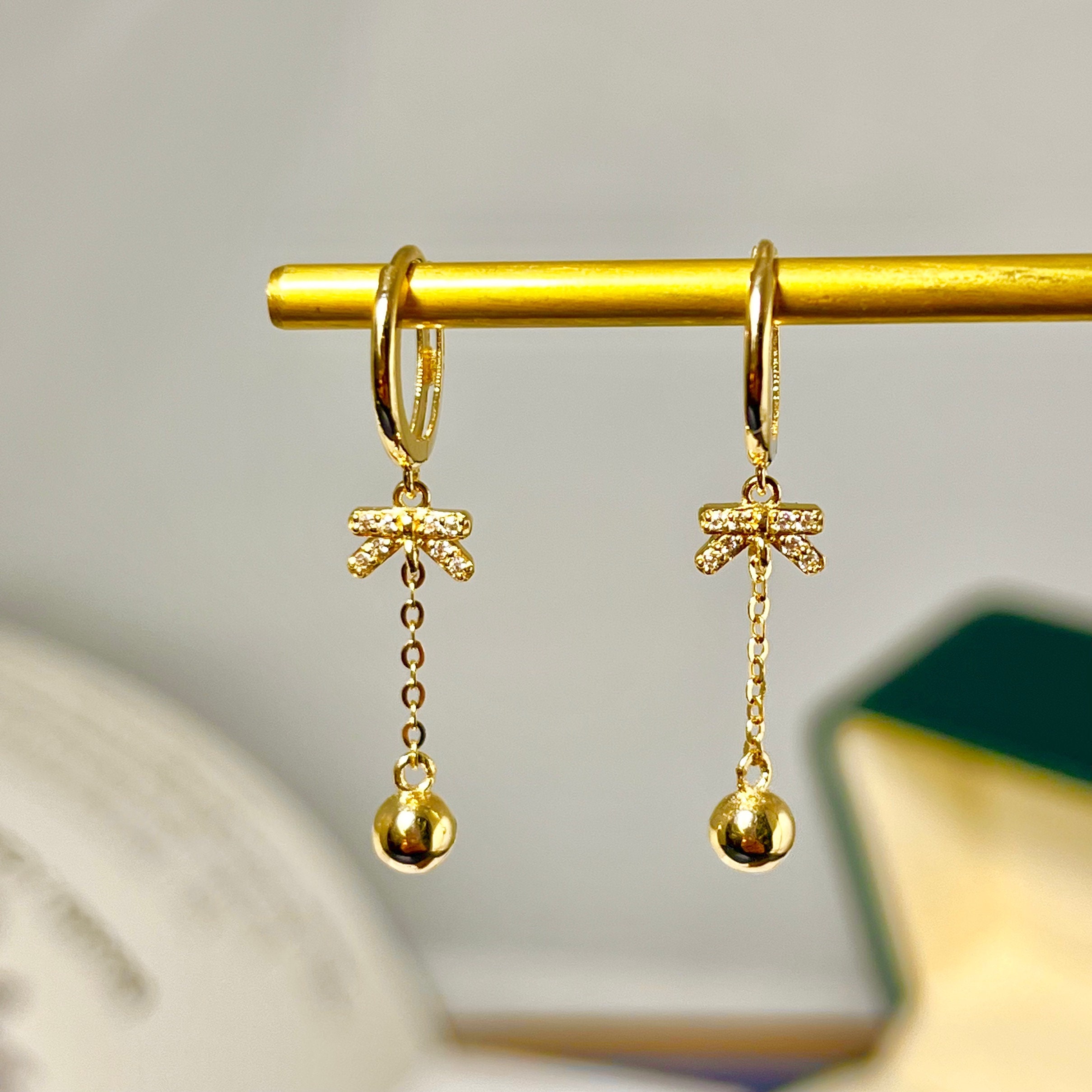 Gold drop store dangle earrings