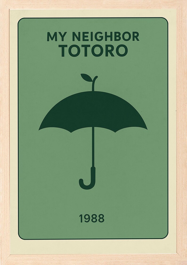 Puede incluir: Un p&oacute;ster enmarcado con el texto "MY NEIGHBOR TOTORO" y un gr&aacute;fico de paraguas verde oscuro. El a&ntilde;o "1988" est&aacute; impreso debajo. El fondo es de color verde claro.