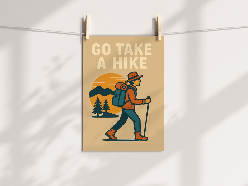 May include: Tan poster with the text "GO TAKE A HIKE" above an illustration of a hiker. The hiker is wearing a hat, backpack, and hiking boots, and is walking with a walking stick. The background features a sunset, mountains, and pine trees.