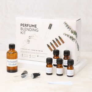 perfume blending kit diy make your own perfume with fragrance oils and glass bottle image 1