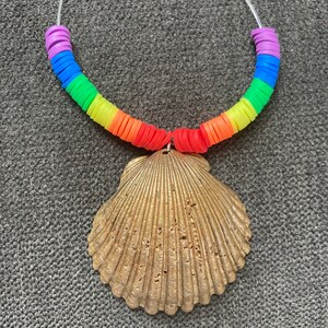 Gold shell pendant with rainbow beads