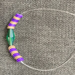 Green, gray and purple beaded bracelet