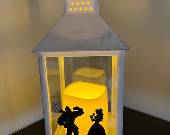 Lanterna noturna da Bela e a Fera