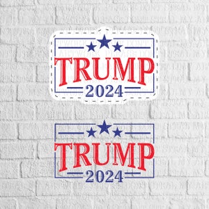 May include: Two red, white, and blue political campaign signs with the text "TRUMP 2024" and three blue stars.