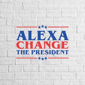 May include: A white brick wall with the text "ALEXA CHANGE THE PRESIDENT" in blue and red letters with five stars above and below the text.