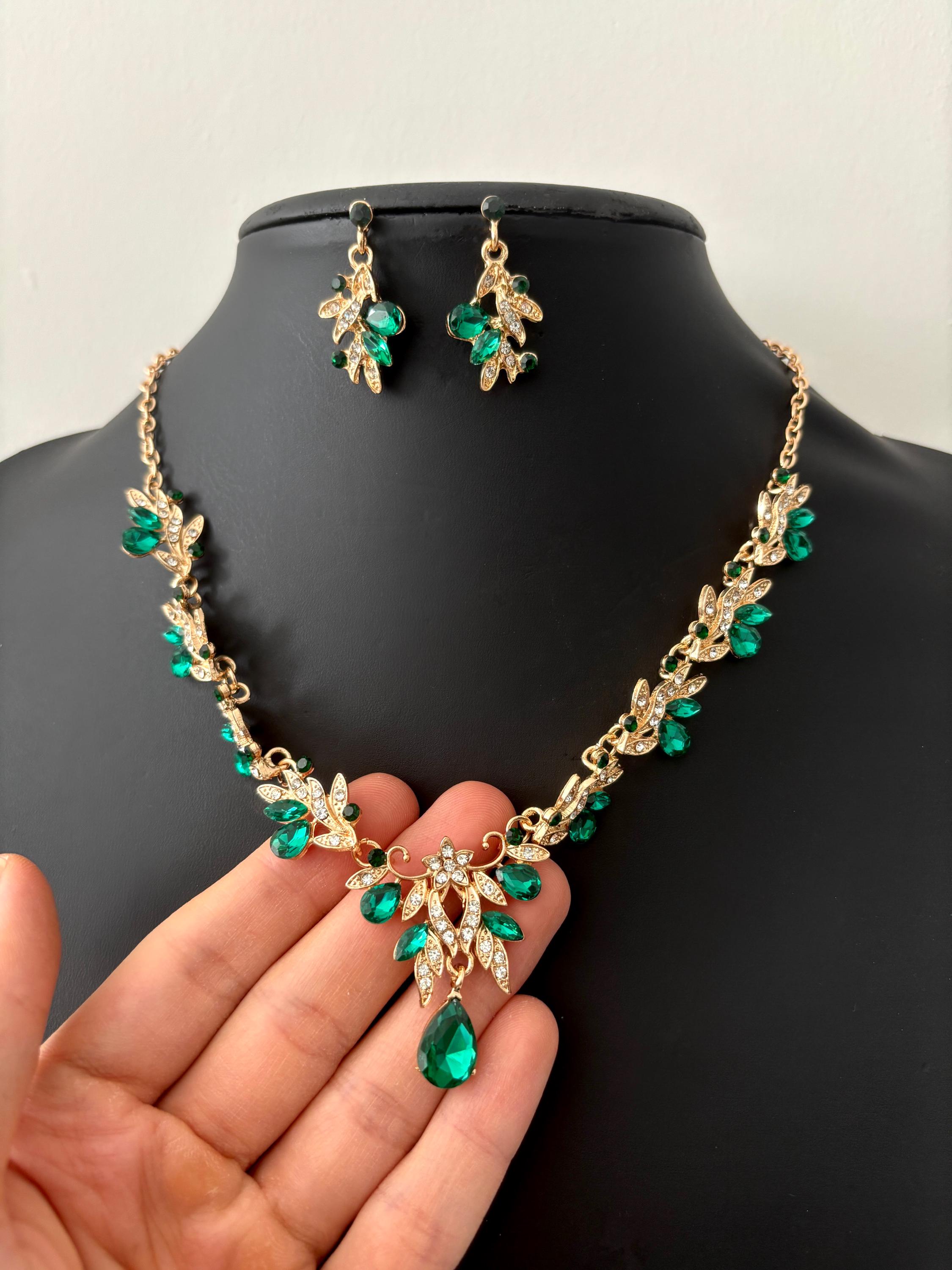 emerald green dress gold accessories Serena Bute London Silk Slip Dress with Lace Trim main image 1