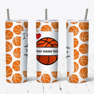 May include: White tumbler with a basketball pattern and the text "I love you" and "your name here". A basketball is in the center of the tumbler.