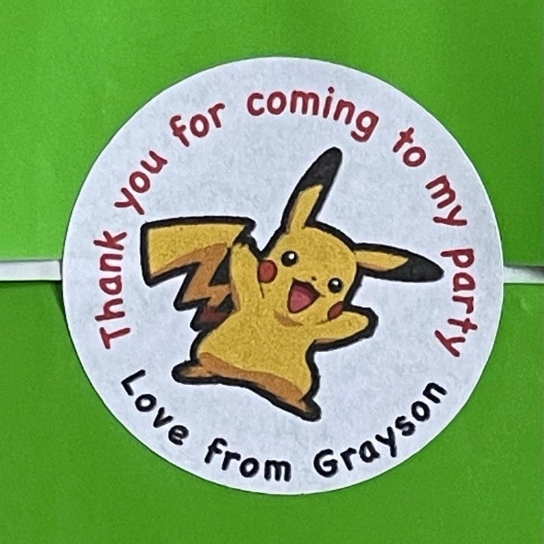 May include: Round white thank you sticker featuring a yellow Pikachu cartoon character. The sticker reads "Thank you for coming to my party Love from Grayson".