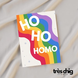 Postkarte "Ho Ho Homo Regenbogen" von Très Chig Studio, Weihnachten, Weihnachtsgeschenk, Winter, Pride, queer, schwul, Proud, Schneeflocke