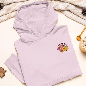 Book Reading Pumpkin Embroidered Heavy Blend Hoodie - Stylish Soft Cotton - Variety of Colors - Cute Fall and Halloween Design