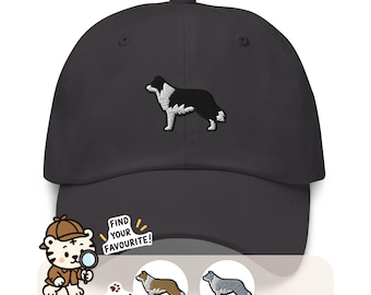 May include: A charcoal grey baseball cap featuring an embroidered black and white border collie on the front. Below the cap, a cartoon tiger with a magnifying glass points to the text FIND YOUR FAVOURITE! next to two small dog embroidery options.