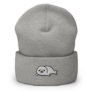 Gorro de invierno unisex acogedor con puños bordados de foca arpa