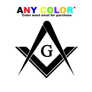 Puede incluir: Gráfico en blanco y negro de un símbolo masónico, con un compás y una escuadra y la letra "G" en el centro. El texto "ANY COLOR" y "Color must exist for purchase" están en la parte superior.
