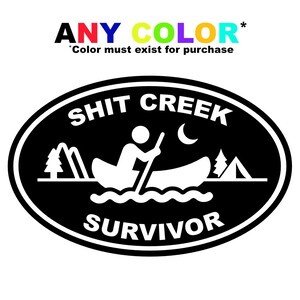 May include: Black and white oval sticker with the text "SHIT CREEK SURVIVOR". The design features a person in a canoe, mountains, trees, and a crescent moon. Above the oval is the text "ANY COLOR" in multiple colours.