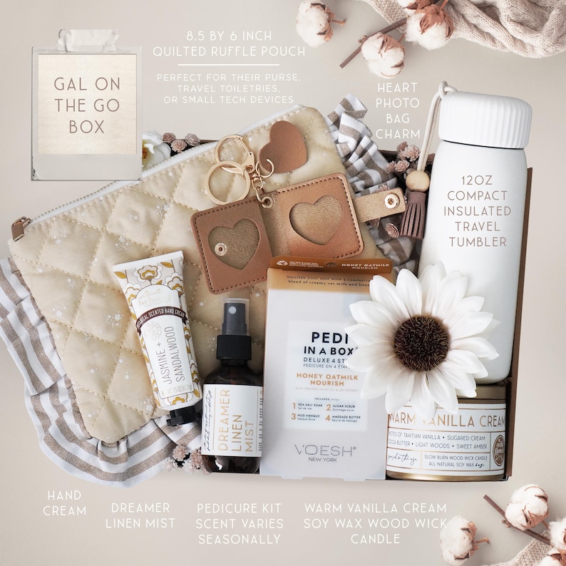 May include: A gift set featuring a quilted ruffle pouch, a heart photo bag charm, and a 12oz insulated travel tumbler. Includes hand cream, Dreamer linen mist, a pedicure kit, and a warm vanilla cream soy wax wood wick candle. The pouch is 8.5 by 6 inches.