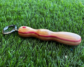 Recycled skateboard bottle opener