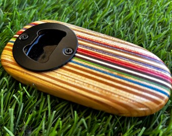 Recycled skateboard bottle opener