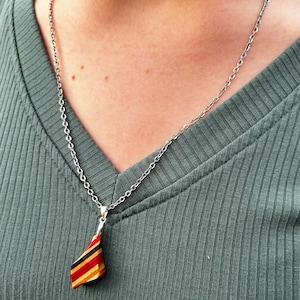 Recycled skateboard necklace