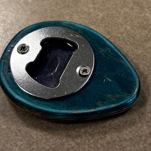 Gerecycleerde skateboard-flesopener