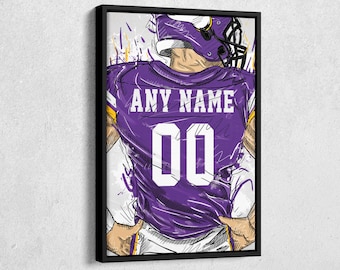 May include: Framed artwork of a football player in a purple jersey with the text "ANY NAME" and the number "00". The player is wearing a purple helmet. The artwork has a black frame and a white background with purple and yellow accents.