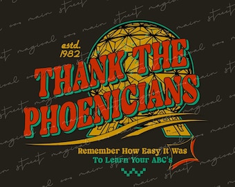 May include: A digital file design with a retro-style graphic featuring a yellow and orange geodesic dome with the text "THANK THE PHOENICIANS" in red, green, and yellow letters. The text "Remember How Easy It Was To Learn Your ABC's" is below the dome in white letters. The design is set against a dark gray background with the text "magical" and "main street" repeated in white.