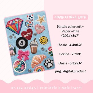 May include: A light blue Kindle insert with various embroidered patches, including a diamond, cat, hearts, and a smiley face. The text "COMPATIBLE WITH" and Kindle model sizes are listed. The design is a digital product.