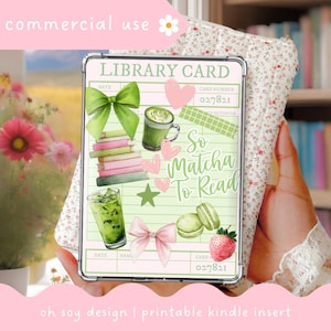 May include: A pink and green Kindle insert with a library card design. It features illustrations of matcha drinks, books, bows, and macarons. The text includes "LIBRARY CARD" and "So Matcha To Read". The design also includes the text "commercial use" and "oh soy design | printable kindle insert".