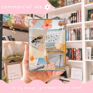 May include: A clear Kindle insert featuring a beach-themed collage with a heart-shaped hat, sunglasses, seashells, and the text "BEACH READ." The insert includes images of an orange slice, ice cream, and a small airplane. The words "commercial use" and "oh soy design | printable kindle insert" are also visible.