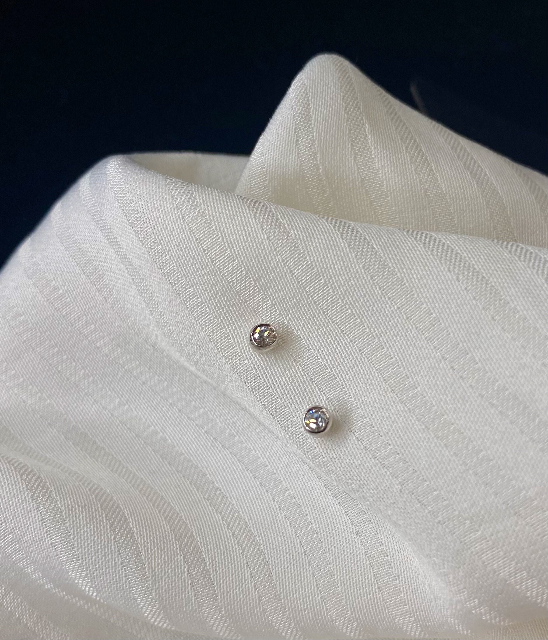 STERLING SILVER stud Earrings or Match Ear & Nose |  set with Cubic zirconia   | One pair left !!