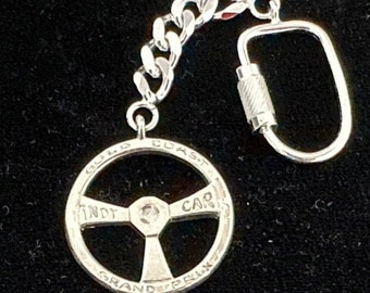 S/S .925 KeyChain-Large Steering wheel 29mm dia-16.6 gr.-Lenght 10.8cm with Curb chain -1 st Australian INDY Car GRAND PRIX-Gold Coast 1991-