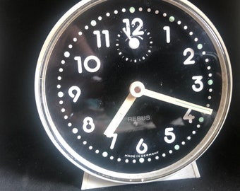 1970 Rebus mech. Sveglia Sveglia Elegante Orologio da tavolo Bianco Germania