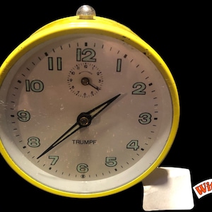 1960s TRUMPF mech. Alarm Clock Alarm Clock Stylish Table Clock yellow Germany