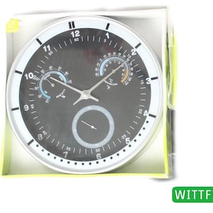 New stylish kitchen clock in original packaging wall clock thermometer hygrometer and second counter battery operated 25 cm quartz black and white Germany VP06