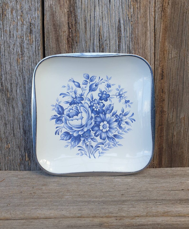 Small blue and white enamel dish / plate / bowl with floral design and stainless steel base Made in Japan image 1