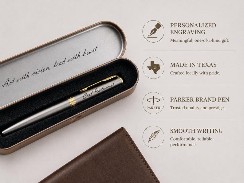 May include: A silver Parker pen with gold accents, engraved with "Carl Radarcich," rests in an open, metallic case. The case is lined with black fabric and features the inscription "Act with vision, lead with heart."