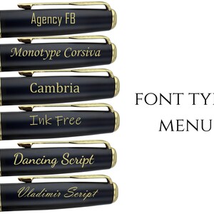 May include: Six black pens with gold-colored clips and trim, each engraved with a different font name: Agency FB, Monotype Corsiva, Cambria, Ink Free, Dancing Script, and Vladimir Script. The text FONT TYPE MENU is displayed to the right.