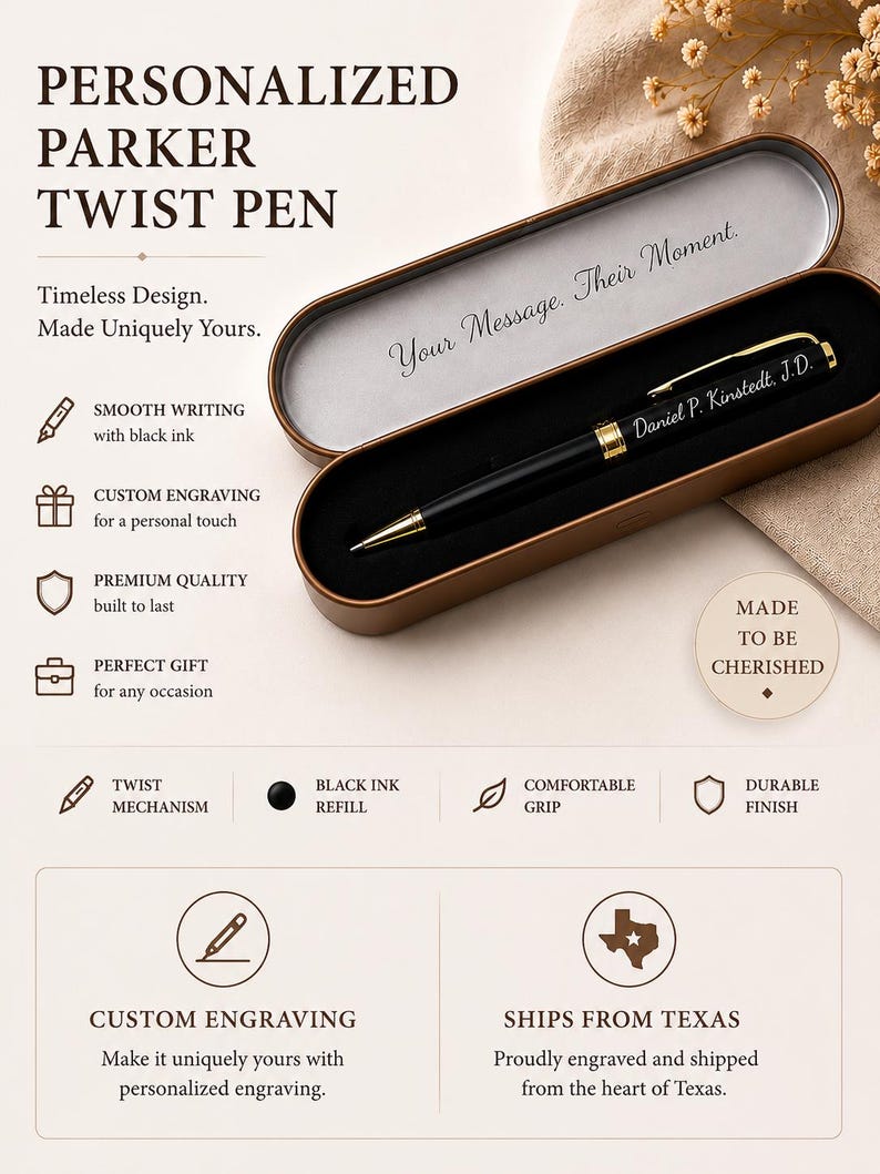 May include: A black twist pen with gold-tone accents and a gold clip, featuring the engraved name Daniel P. Kinstedt, J.D. The pen rests inside an open, elongated, metallic brown case with a black interior lining and a silver-colored lid interior.