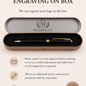 May include: A black ballpoint pen with gold-colored accents rests inside a rectangular metal case. The inside lid of the case features the engraved text MILLER & CO. with a circular M logo surrounded by laurel leaves. The image includes text instructions.