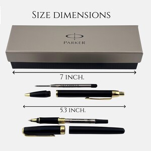 May include: A black and gold Parker pen set with a rectangular box. The box measures 7 inches in length. The pen components are displayed disassembled, with the main pen body measuring 5.3 inches in length, including a refill and cap.