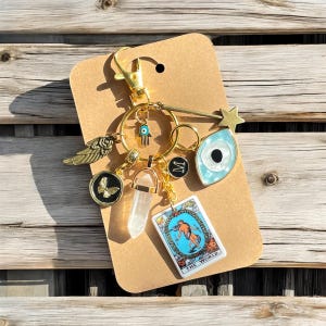 Dije de bolso personalizado, llavero de cristal, carta del Tarot EL MUNDO, regalo para viajes seguros, mal de ojo, protección, festividades, regalo significativo de Navidad.