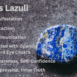 May include: A close-up of a Lapis Lazuli stone with white text listing its properties: Manifestation, Protection, Communication, and more. The stone is a deep blue color with white and gold veining, set against a textured gray background.