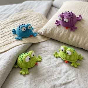 May include: A set of three ceramic mugs with a speckled, matte finish. The mugs are in shades of cream, light gray, and dark gray. Each mug has a simple, modern design and a rounded handle. Perfect for coffee or tea.