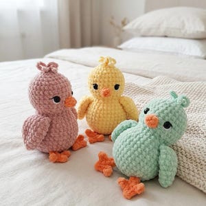 May include: A white ceramic mug with a black handle and the text "But First, Coffee" in a bold, black font. The mug is set against a neutral background, highlighting its simple design.